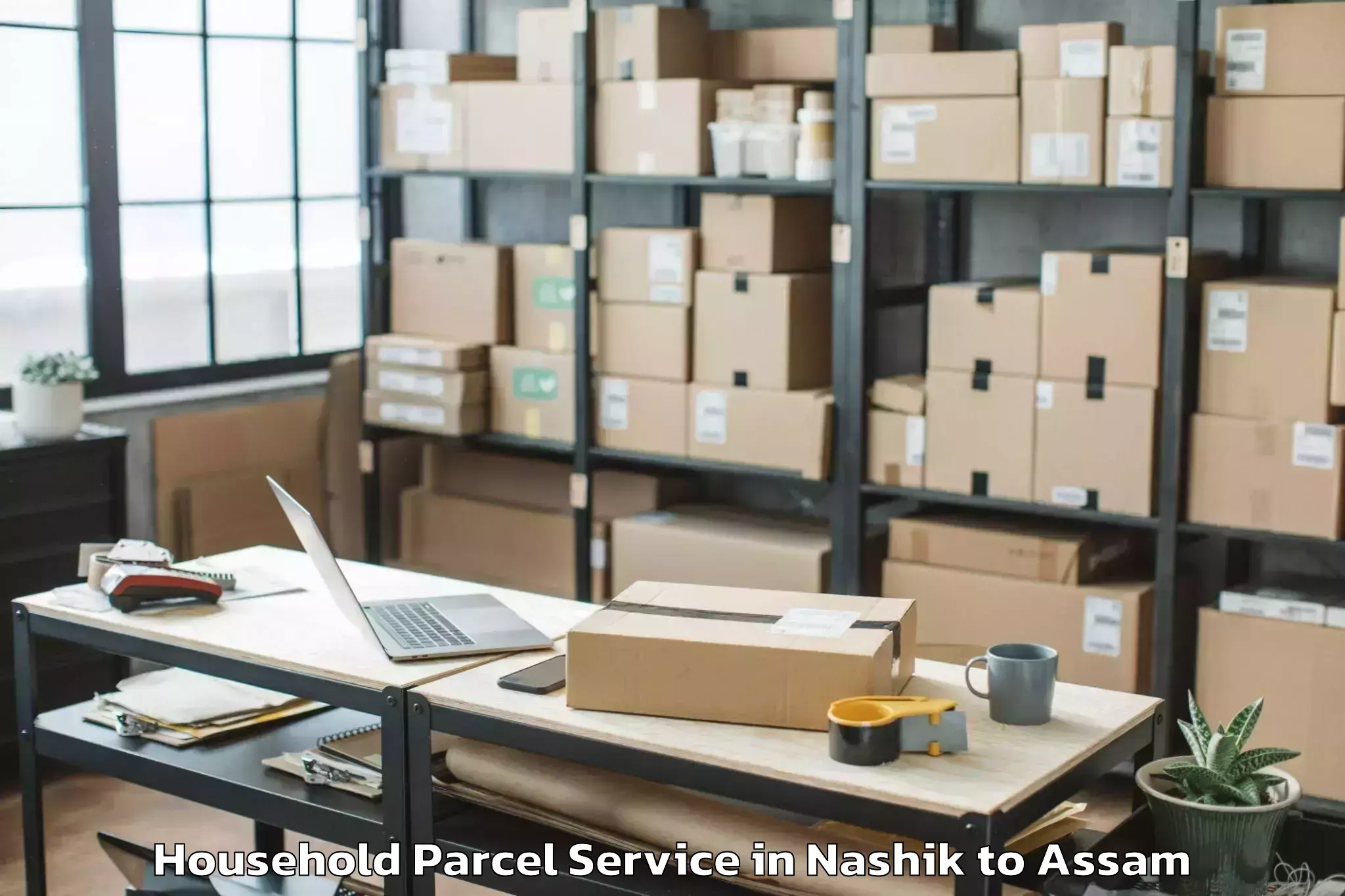 Top Nashik to Nagaon Household Parcel Available